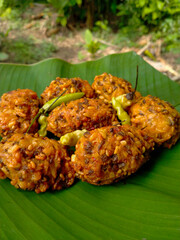 lento food from Indonesia. banana leaf background. close up shot outdoors.