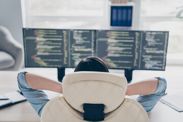 Rear back behind view portrait of attractive experienced girl geek tech support researching web...