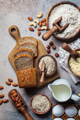 Keto bread cooking. Different types of nut flour - almond, hazelnut, cashew and baking ingredients,...