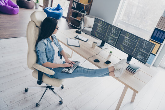 Full size photo of skilled lady designer sir desk using equipment device testing java script modify platform in workstation