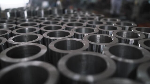 close of of industrial shiny steel parts cylinder shape Regular metal production from lathe machine, mechanical precision spare parts ready for shipping and export