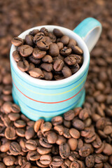 Coffee beans in an espresso cup