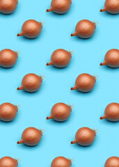 Background pattern. Cloned onion head on a blue background.