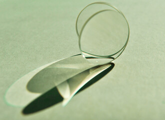 Two circular convex lens with different focus lengths put close together creating refraction image...