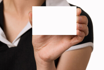 Obraz premium Young woman shows a credit card..
