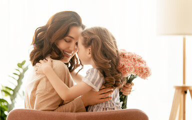 daughter congratulating mother
