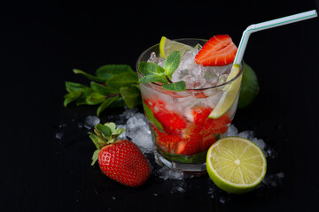 Strawberry mojito. Refreshing summer drink with berries, lime and mint