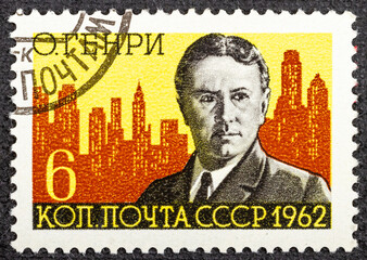 USSR - CIRCA 1962: A stamp printed in USSR shows O. Henry and New York Skyline William Sidney...