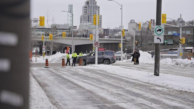 Freedom Convoy Trucker Protests 2022 Ottawa Ontario Canada Anti-Mask Anti-Vaccine Mandates COVID-19 Police Barriers