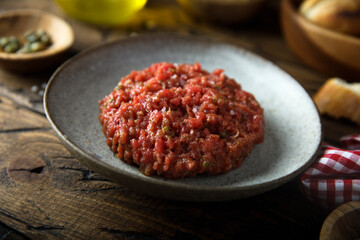 Traditional steak tartare with capers