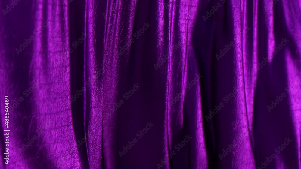 Poster folds of violet fabric sway in the wind. texture. close-up. 3d animation