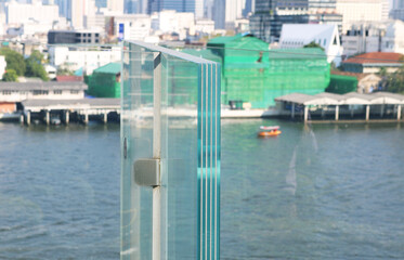 Laminated glass railing  special layer with blurred skyscraper city view background.	