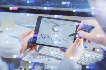 Multi exposure of man's hands holding and using a digital device and data theme drawing. Innovation concept.