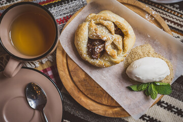 Traditional Georgian sweets and desserts with hazelnuts, walnuts, grape juice, honey, chocolate. Baklava, nakhini, churchkhela. Fresh fruits and candied fruits. Traditional Turkish coffee.