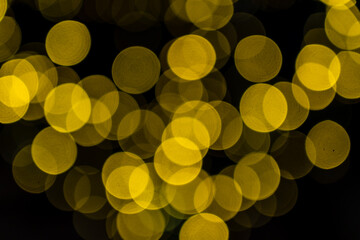 Elegant and romantic golden Christmas lights background with bokeh