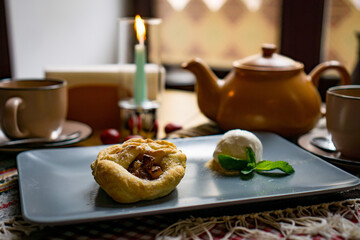 Traditional Georgian sweets and desserts with hazelnuts, walnuts, grape juice, honey, chocolate. Baklava, nakhini, churchkhela. Fresh fruits and candied fruits. Traditional Turkish coffee.