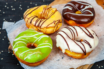 glazed donut on wood background.