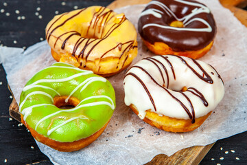 glazed donut on wood background.