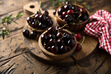 Fresh cherry served in wooden bowls