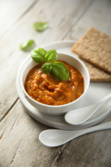 Homemade roasted vegetables dip with fresh basil