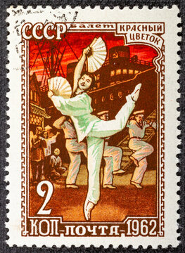 RUSSIA - CIRCA 1962: post stamp printed in USSR CCCP, soviet union shows Russian ballet red flower woman with fans, sailors and ship Scott 2548 A1296 2k, circa 1962