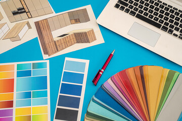 beautiful color palette with cool sketches spread out on a spacious table.