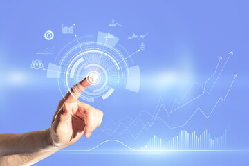 Close up of businessman hand pointing at abstract digital business interface on blurry blue background. Technology, finance, success, economy and growth concept. Double exposure.