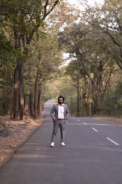 person walking on the road