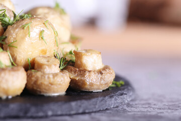 mushrooms and champignons baked in the oven with butter