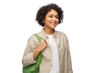 eco living, zero waste and sustainability concept - portrait of happy smiling woman with green...