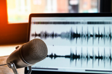 Microphone and wave form on laptop screen