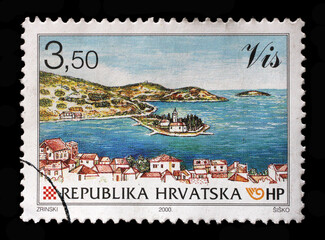 A stamp printed in Croatia shows City view of Vis with Peninsula Pirovo, Series Croatian cities,...