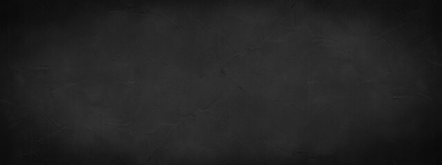 Black anthracite dark gray grey grunge old aged retro vintage stone concrete cement blackboard chalkboard wall floor texture, with cracks - Abstract background banner panorama pattern design template