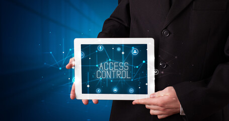 Person holding tablet, security concept