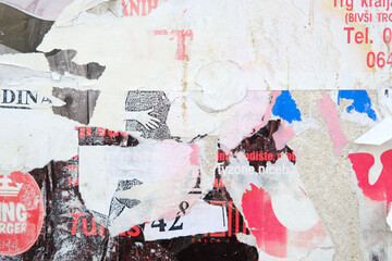 Ripped street poster background. Torn paper, abstract texture.  