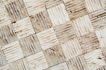 Plaid stone texture background. Mixed lines in beige color