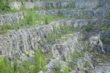 Photography of an open pit development, top view. Quarry mining of minerals and minerals, mines and industry.
