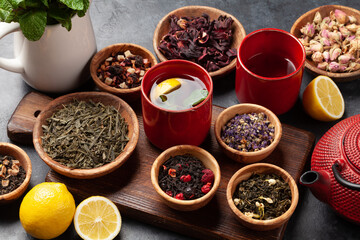 Various dried tea and teapot