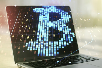 Creative Bitcoin concept with modern laptop background. Multiexposure