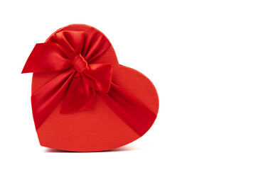 Red box in shape of heart. Gift box for Valentine's Day. Isolated on white background.