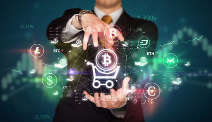 Businessman holding currency symbols