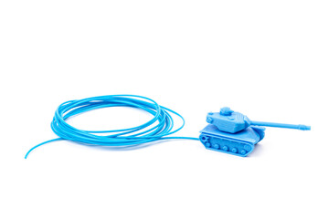 Toy tank of blue color. Close-up of little plastic ABS model. Blue filament. Objects printed by 3d printer Isolated on white background.