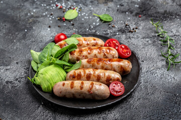 Delicious sausages grilled, Ketogenic diet. Healthy fats, clean eating for weight loss. Keto paleo diet menu. top view