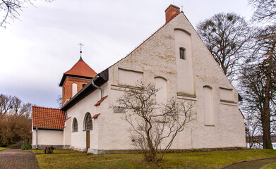 Built at the turn of the 16th and 17th centuries from stone and brick in the Baroque style, the Evangelical-Augsburg church in Sorkwity in Masuria, Poland.