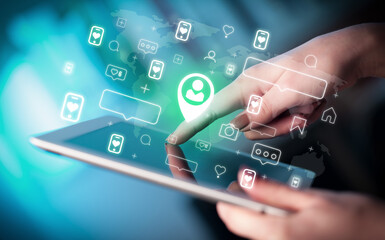 Close-up of a hand using tablet, social media concept
