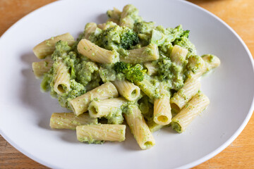 Creamy macaroni pasta with cheese and broccoli. Quick and easy vegetarian recipe.