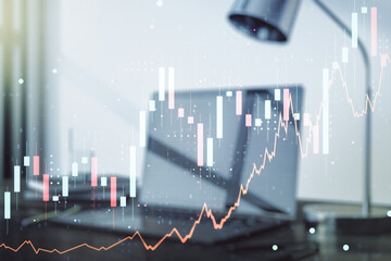 Multi exposure of abstract creative financial graph on modern computer background, forex and investment concept