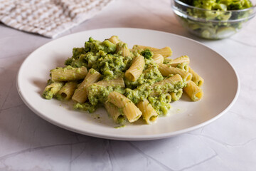 Creamy macaroni pasta with cheese and broccoli. Quick and easy vegetarian recipe.
