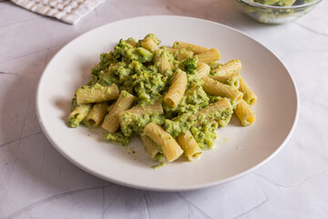 Creamy macaroni pasta with cheese and broccoli. Quick and easy vegetarian recipe.