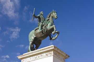 Fototapeta na wymiar Monument to Felipe IV at Plaza de Oriente in Madrid, Spain 